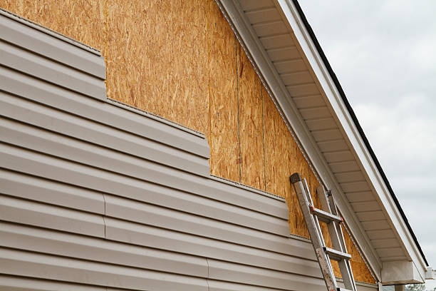Professional Wood Siding technician working in Levittown, NY